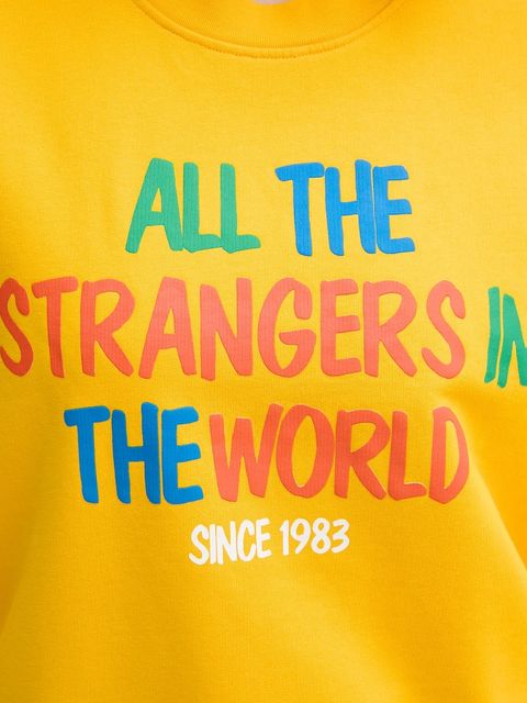 United Colors of Benetton bluza bawełniana dziecięca x Stranger Things damska kolor żółty wzorzysta 33NVD10BB