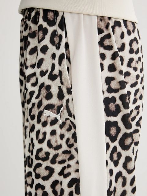 Puma spodnie dresowe damskie kolor beżowy wzorzyste 632343