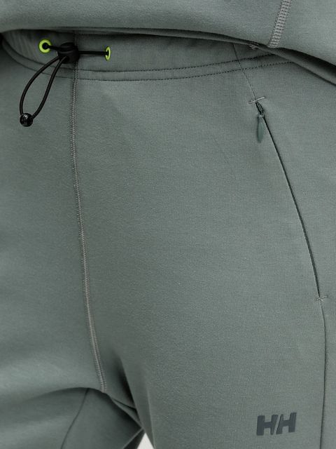 Helly Hansen spodnie dresowe HP TECH damskie kolor zielony gładkie 34492