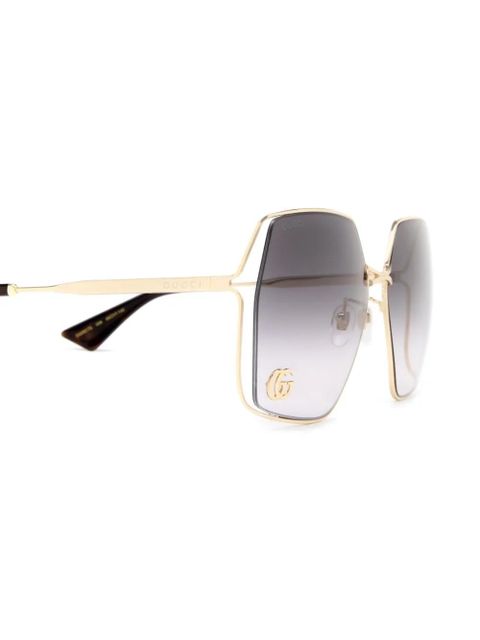 Gucci Eyewear logo-engraved tinted sunglasses - Yellow