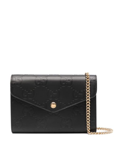 Gucci debossed G monogram crossbody bag - Black