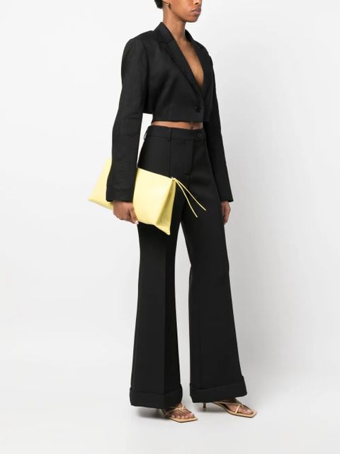 Jil Sander logo-debossed clutch bag - Yellow