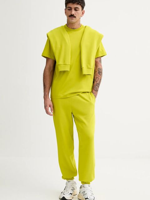 Pangaia spodnie dresowe bawełniane kolor zielony gładkie 10000295