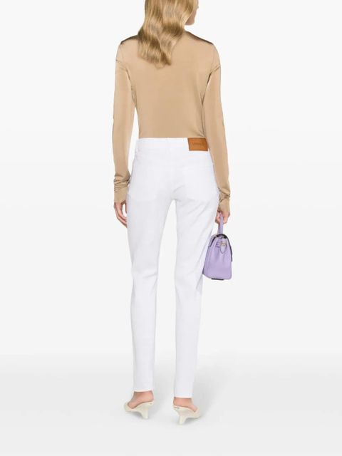 Versace Medusa-plaque skinny jeans - White
