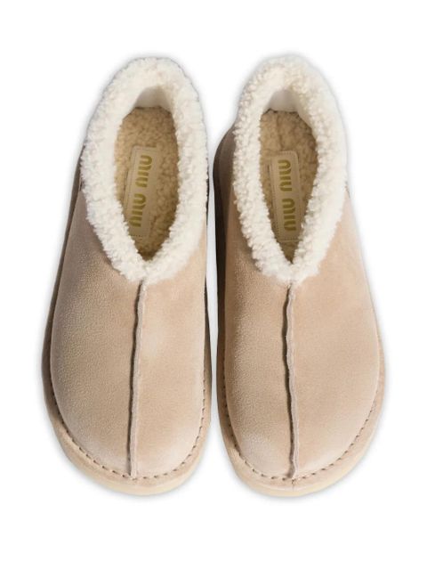 Miu Miu embroidered-logo shearling boots - Neutrals