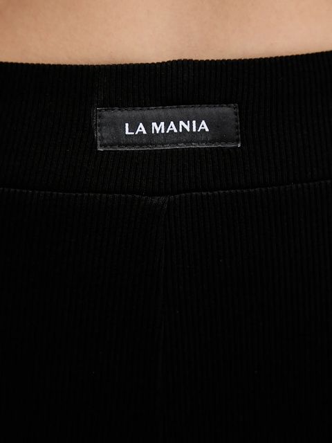 La Mania legginsy damskie kolor czarny gładkie CARE