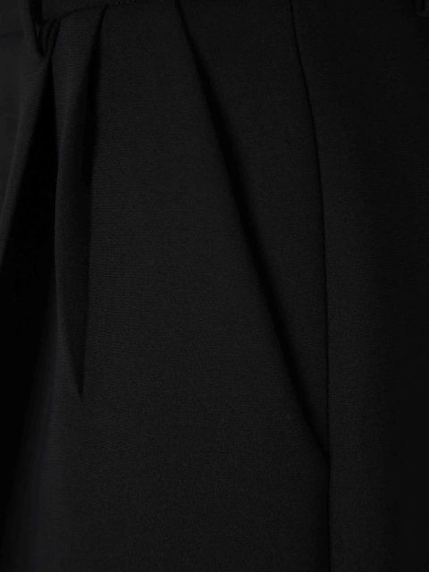 KHAITE pleated high-waisted trousers - Black