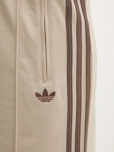 adidas Originals spodnie dresowe Firebird damskie kolor beżowy gładkie KD3660