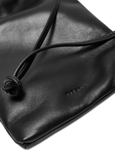 The Row logo-debossed leather crossbody bag - Black