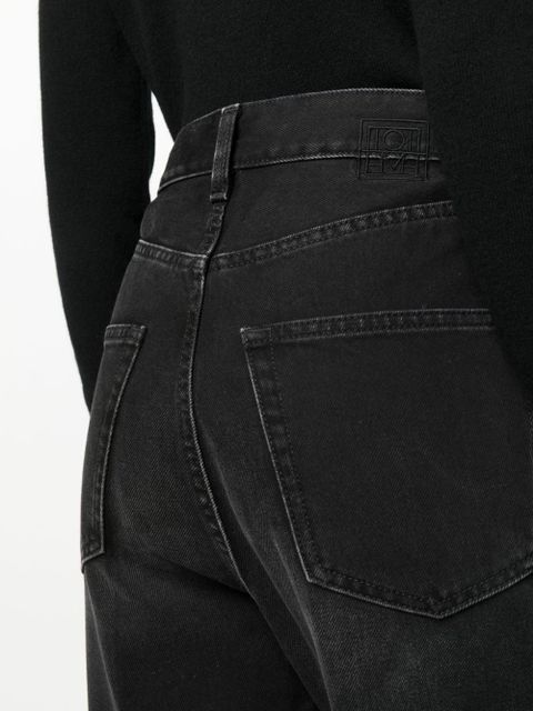 TOTEME faded-effect tapered-leg jeans - Black