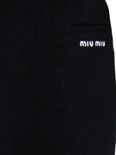 Miu Miu embroidered zip-pocket trousers - Blue