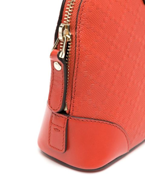 Gucci embossed logo-patch makeup bag - Orange