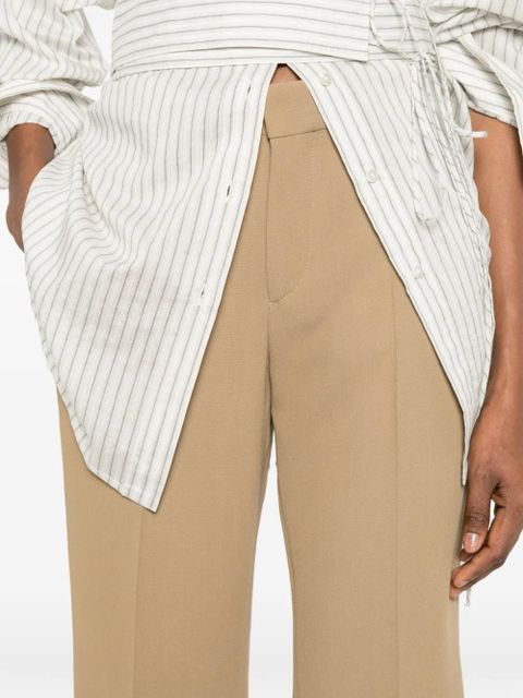 TOTEME Kick pressed-crease flared trousers - Neutrals