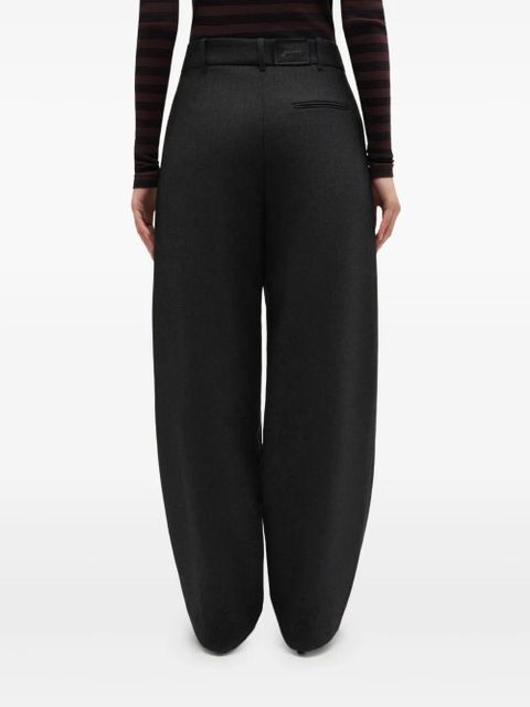 GANNI logo-patch trousers - Grey