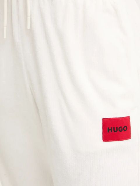 HUGO spodnie lounge damskie kolor beżowy z aplikacją 50531692