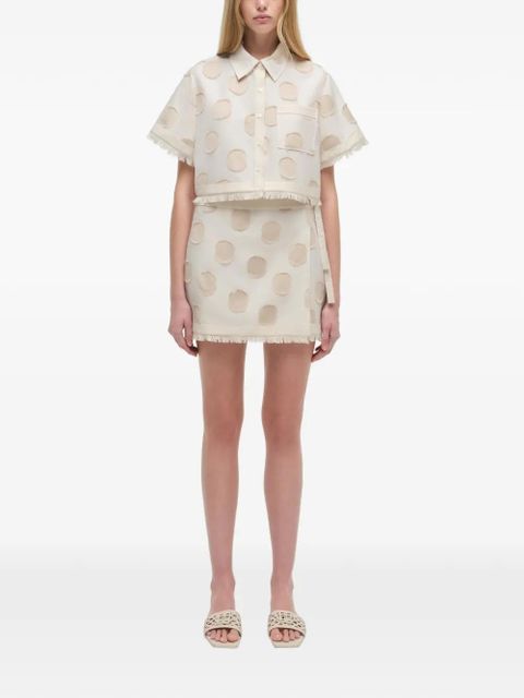 Simkhai Bethany polka-dot fringed mini skirt - Neutrals