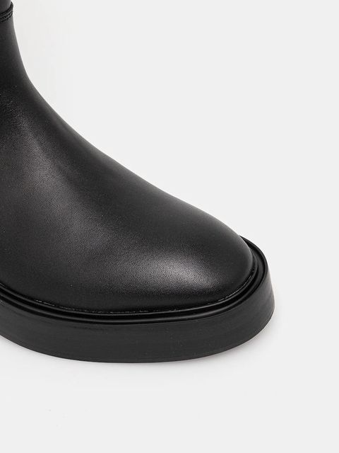 Calvin Klein kozaki skórzane CONCAVE WELT UKT BOOT LTH damskie kolor czarny na płaskim obcasie YW0YW01910