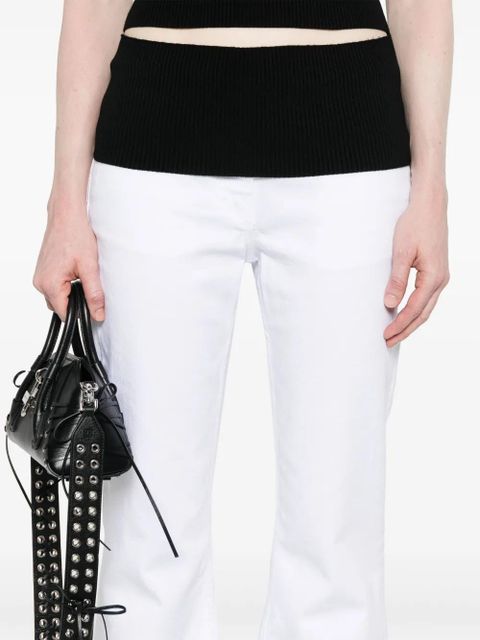 Givenchy raw-cut detail low-rise flared jeans - White