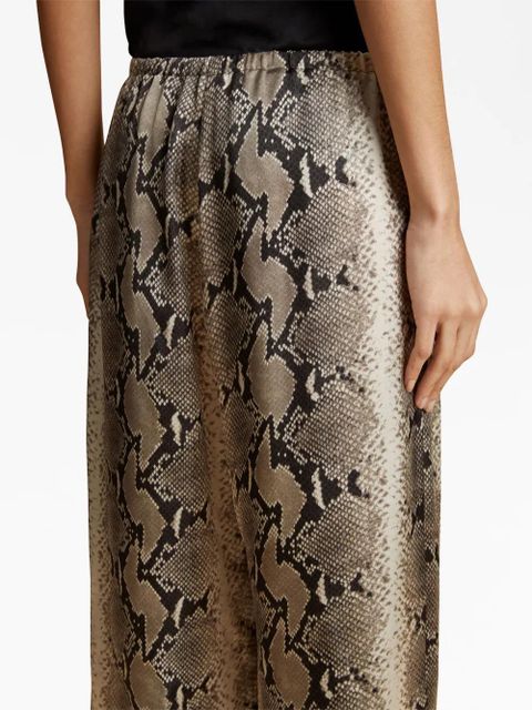 KHAITE Mindy snake-print crop trousers - Black