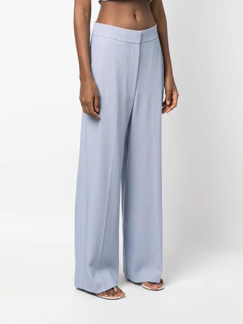 KHAITE high-waisted wide-leg trousers - Purple