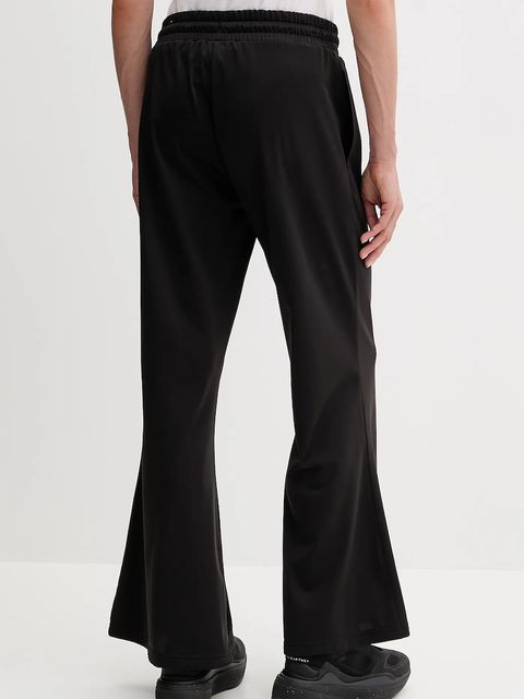 Puma spodnie dresowe damskie kolor czarny gładkie 632045