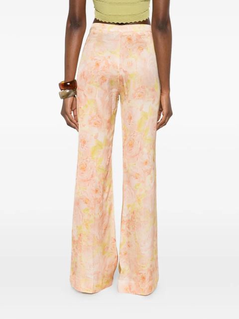 SANDRO floral-pattern trousers - Orange