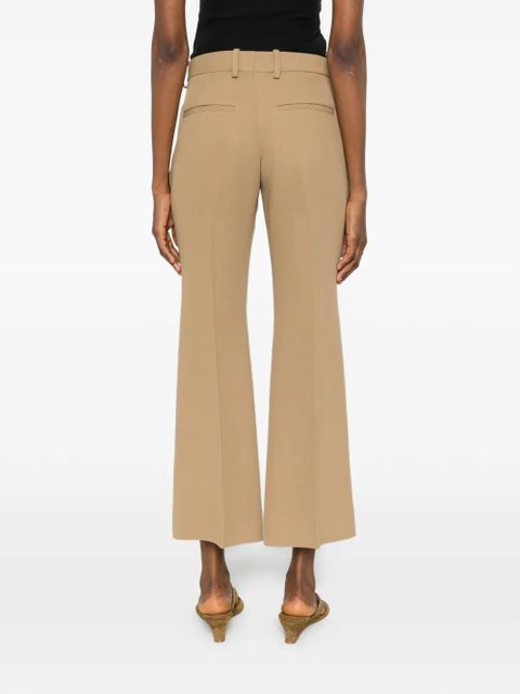 TOTEME Kick pressed-crease flared trousers - Neutrals