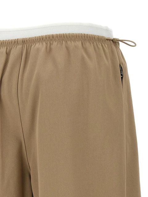 Alexander Wang double-layer logo-waistband trousers - Brown