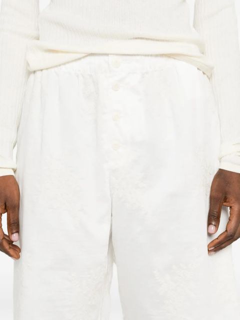 OUR LEGACY Frill buttoned floral shorts - White