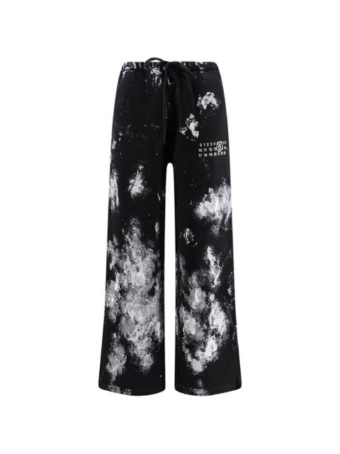 MM6 Maison Margiela paint-splatter logo-print trousers - Black - zdjęcie produktu nr 1