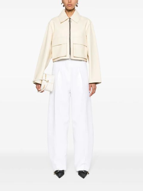 Jacquemus Ovalo pleated palazzo pants - White