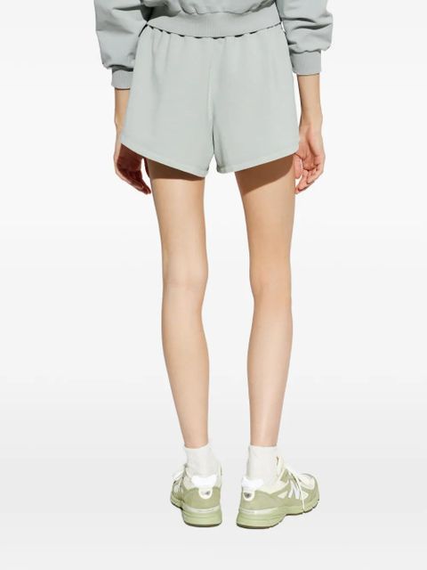 Moschino logo-tape curved-hem shorts - Blue