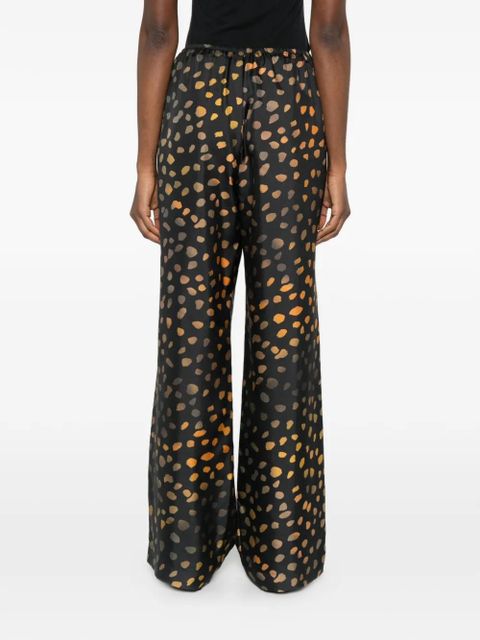 Nanushka elasticated waist dotted trousers - Black