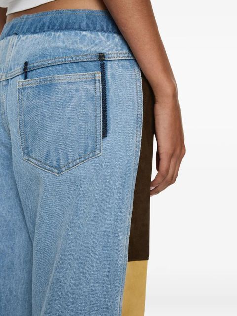 Christopher Esber suede-panelled denim trousers - Brown