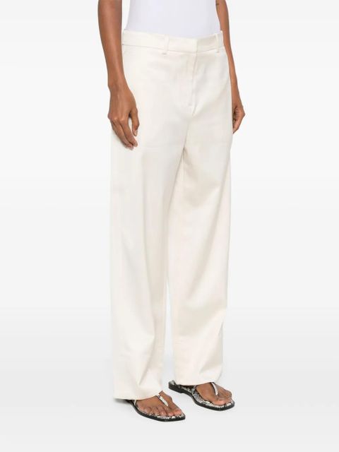 TOTEME twisted-seam trousers - Neutrals