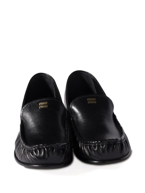 Miu Miu embossed-logo loafers - Black