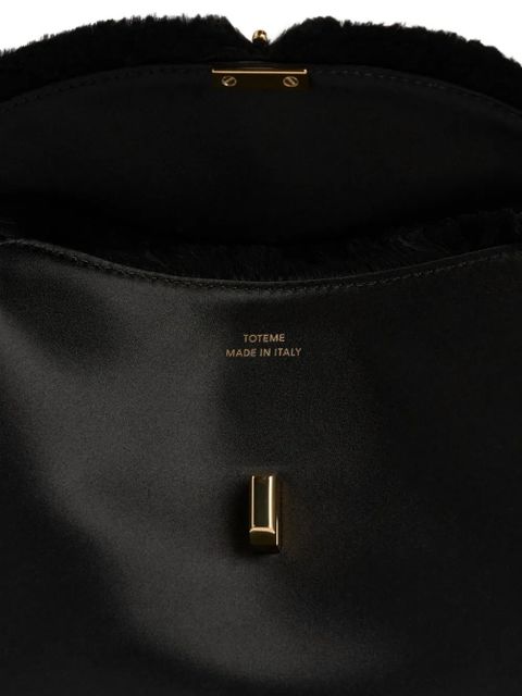 TOTEME mini T-lock frayed clutch bag - Black