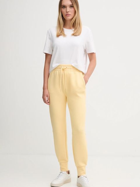 Lacoste spodnie dresowe kolor żółty gładkie XF0343 - zdjęcie produktu nr 2