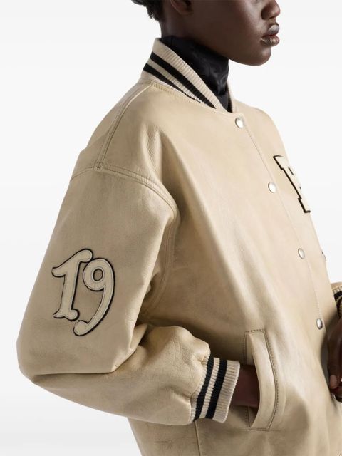 Prada logo-appliqué leather bomber jacket - Neutrals