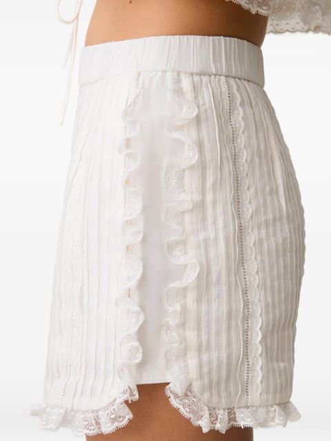 Claudie Pierlot lace-trim pleated shorts - White
