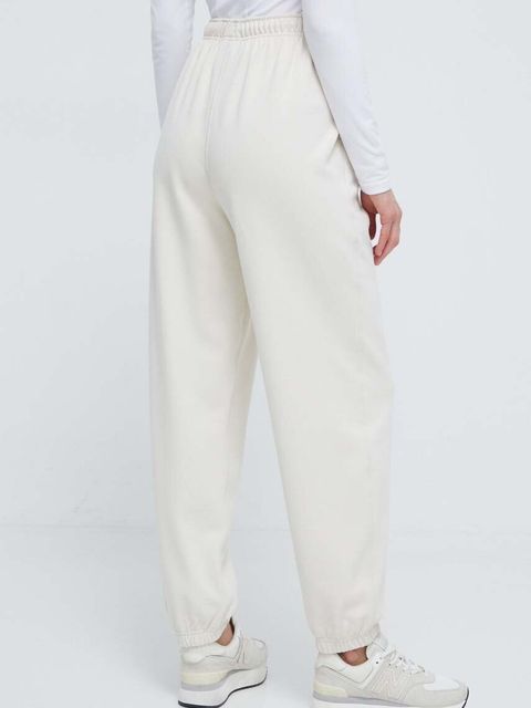 New Balance spodnie dresowe bawełniane WP41513LIN