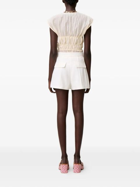 Claudie Pierlot button-fastening pleated shorts - White