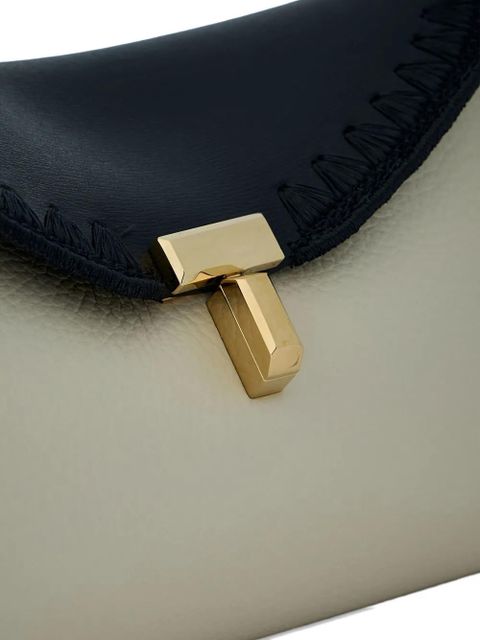 TOTEME pebbled leather clutch bag - Black