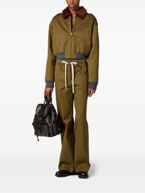 Miu Miu logo-embroidered trousers - Green