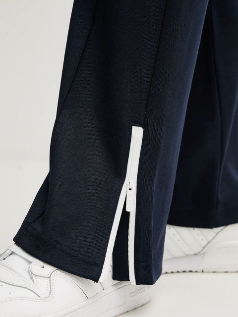 Lacoste spodnie dresowe damskie kolor granatowy gładkie XF5253