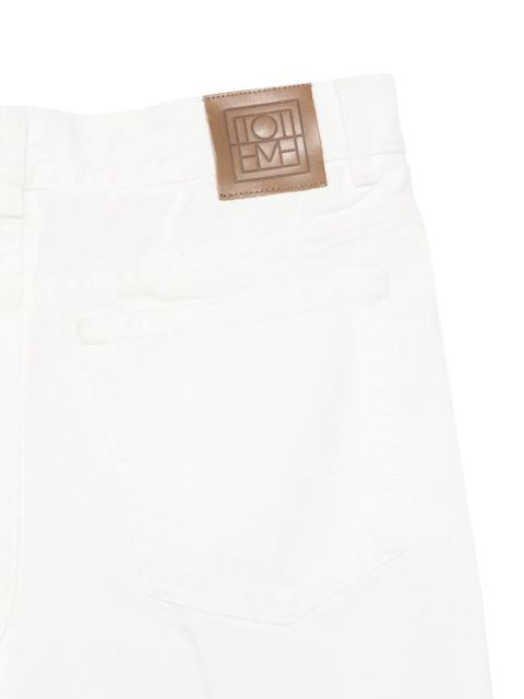 TOTEME Kick belt-loops jeans - White