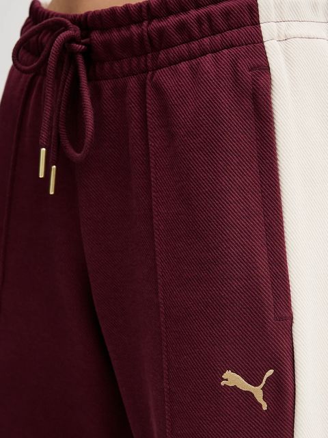 Puma spodnie dresowe damskie kolor bordowy wzorzyste 632138