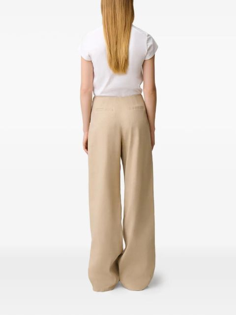 Claudie Pierlot button-embellished pleated trousers - Neutrals