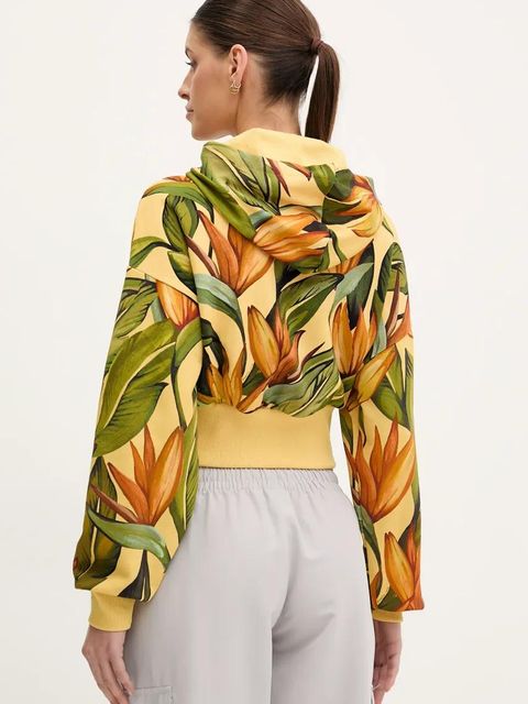 adidas bluza bawełniana x Farm Rio damska kolor żółty z kapturem wzorzysta JD6282
