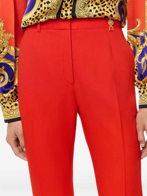 Versace flared wool-blend trousers